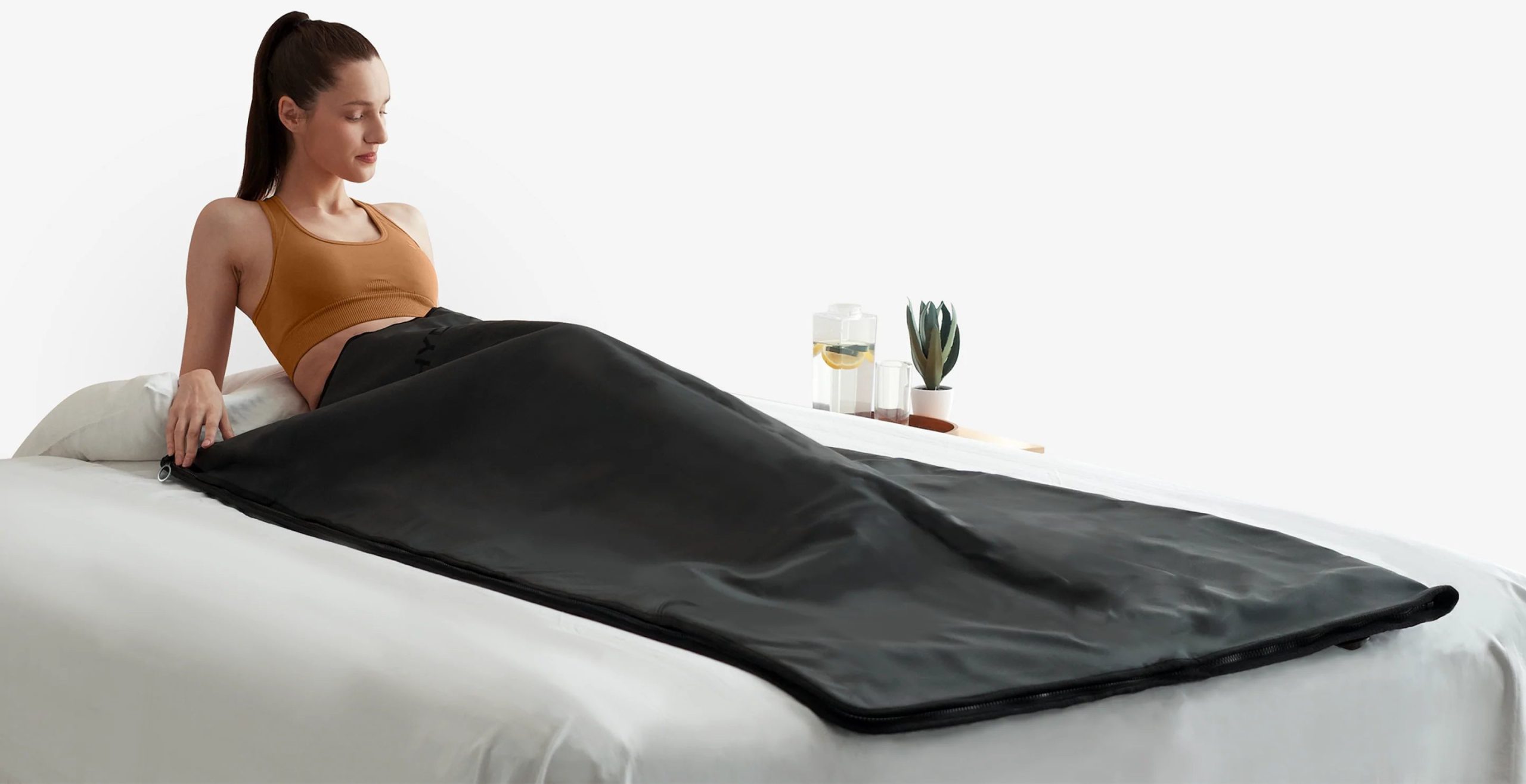 Heat Therapy Unveiled: The Benefits of Using a Sauna Bed Wrap